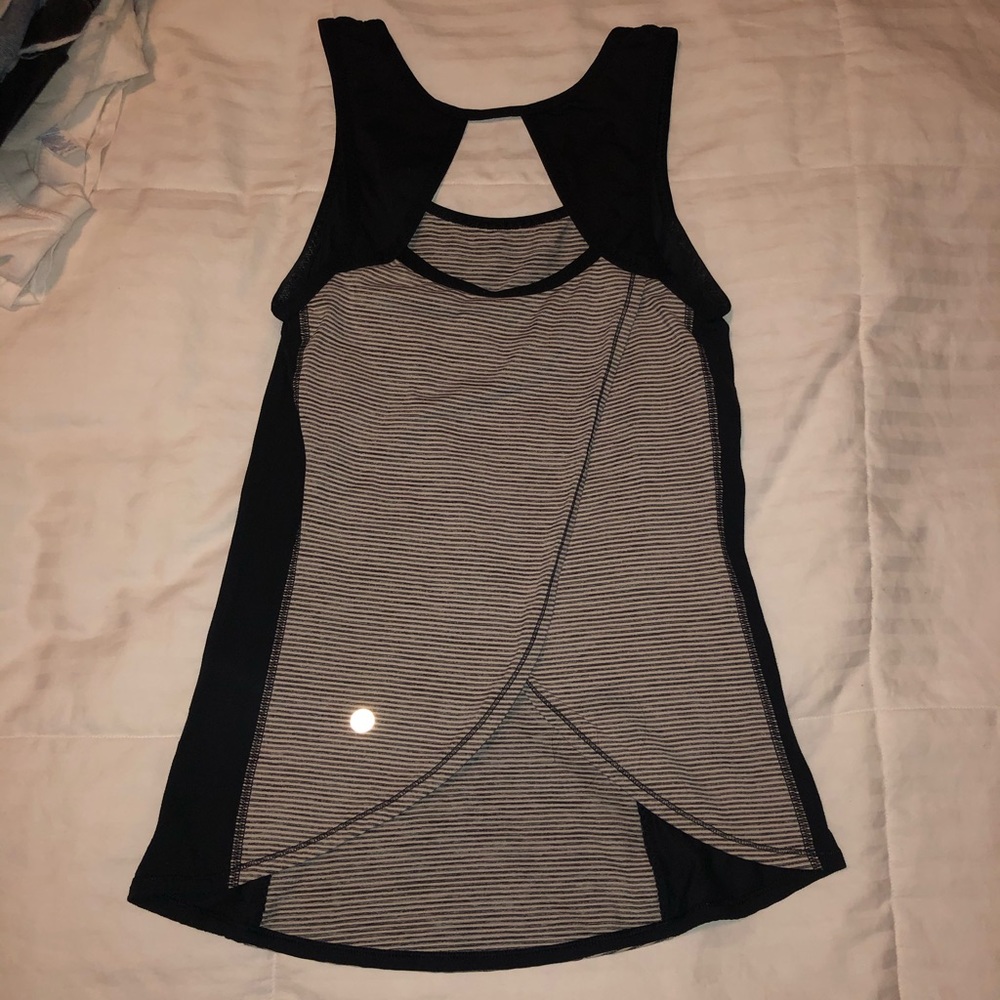 Black lululemon tank top with open back, size 2